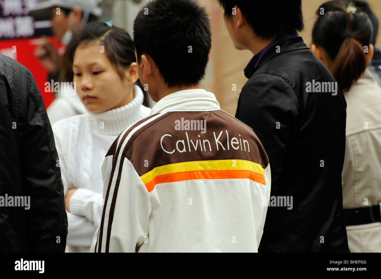 Chinese youth in a Calvin Kline jacket Stock Photo