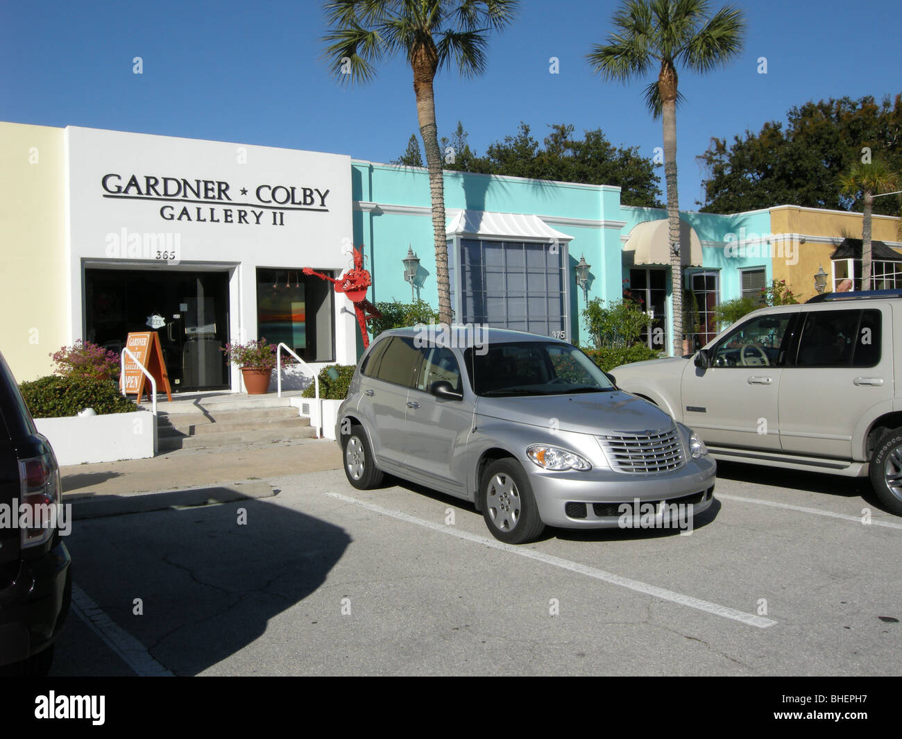2009  Chrysler Cruiser in front of the Gardner Colby Gallery in the historic district of Naples Florida USA Stock Photo