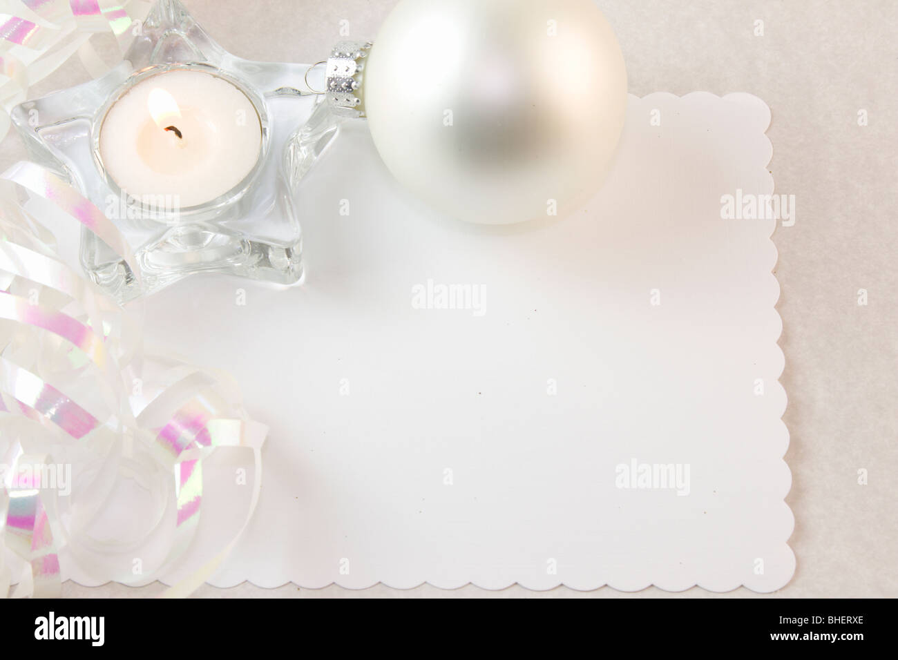 tea light candle and pearl white Christmas decorations and copy space Stock Photo