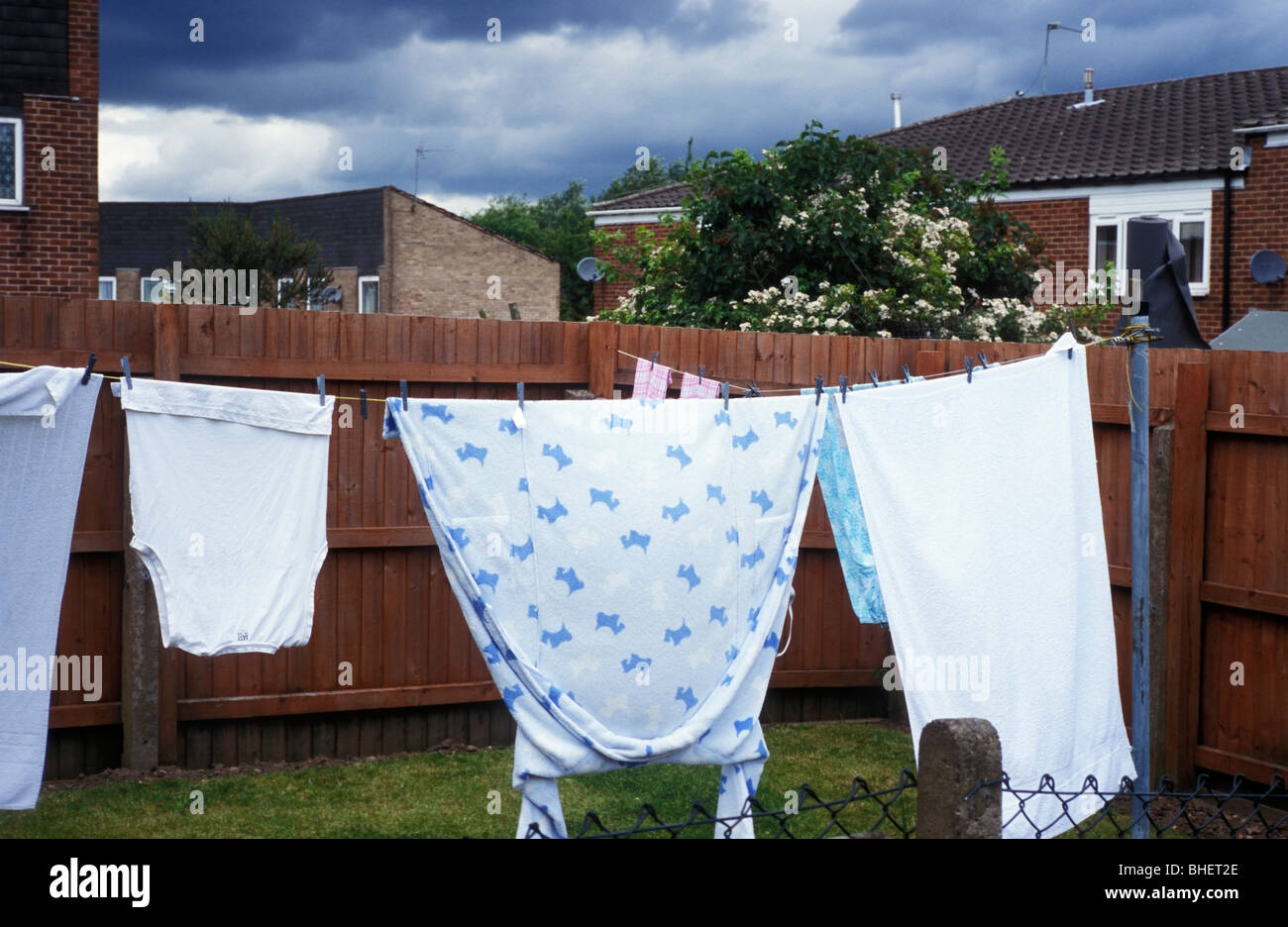 Washing on a washing line on a council housing estate Birmingham UK ...