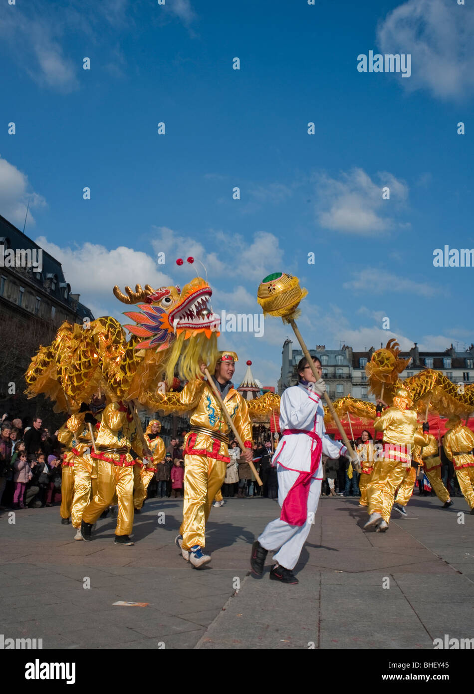Paris, France, Large Group People in Colorful Costumes, Asians Celebrating 'Chinese New year' Annual Street Carnival Parade, Chinese Dragon Dance Stock Photo