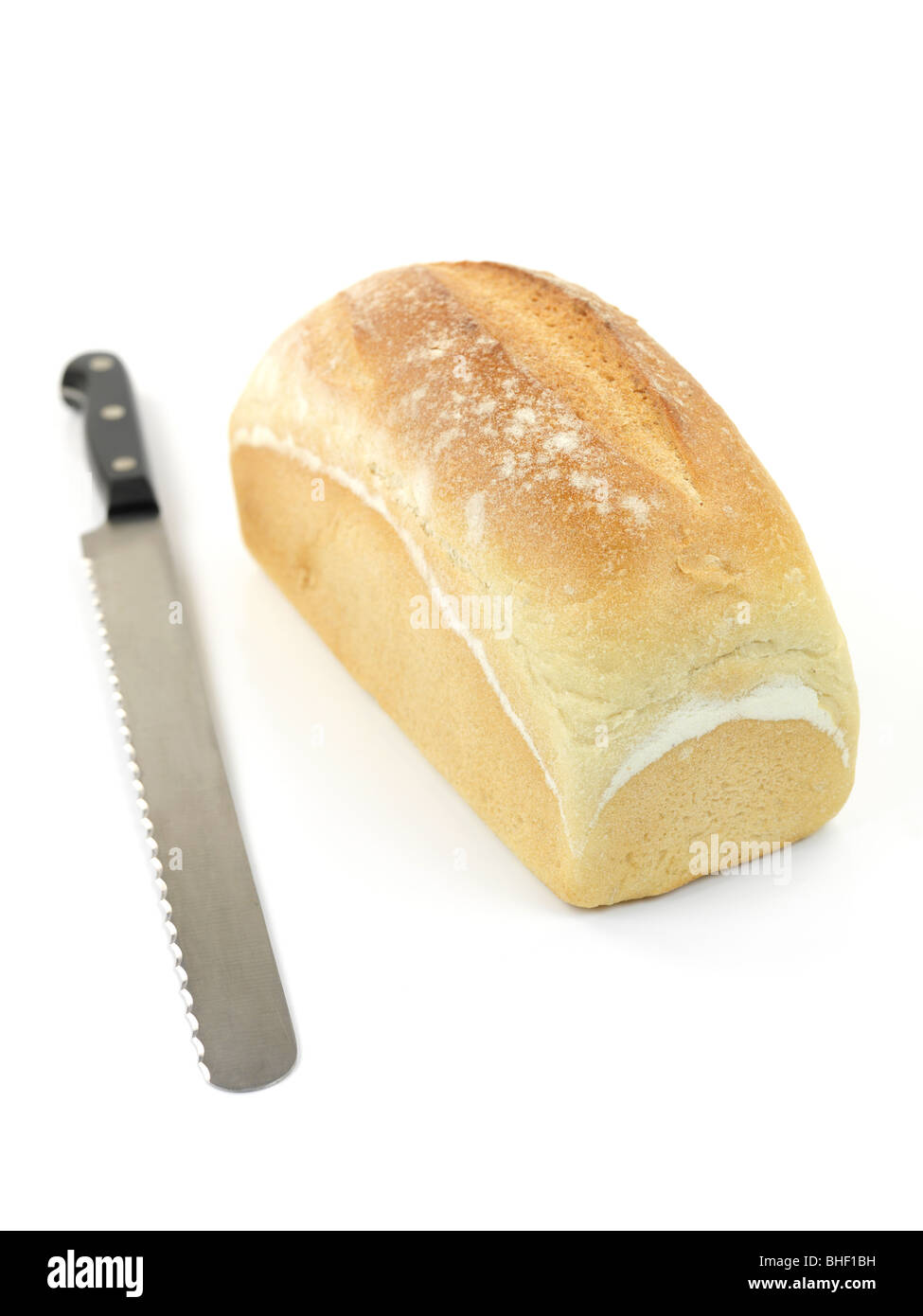 A loaf of bread isolated against a white background Stock Photo - Alamy