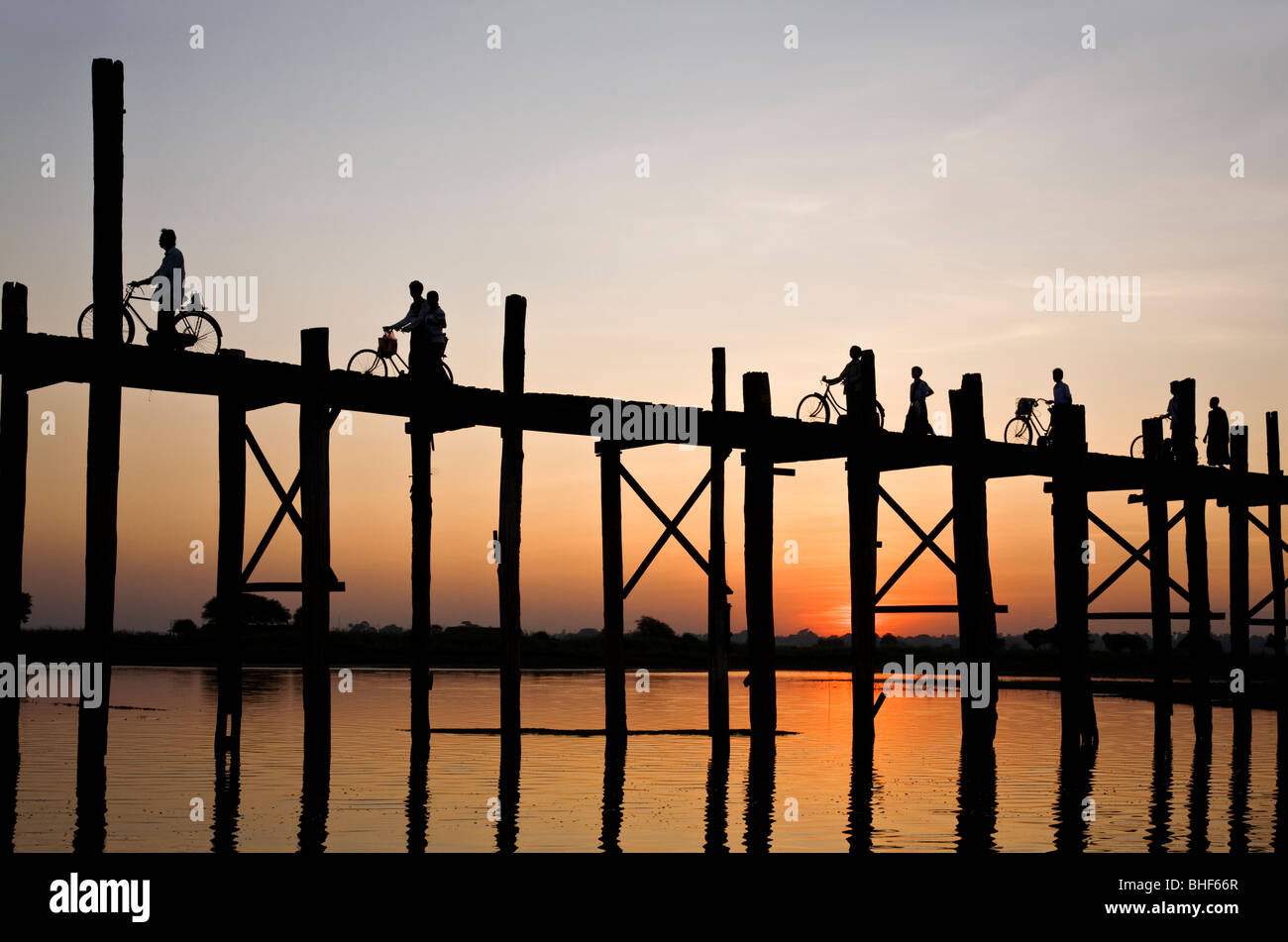 Bridge footbridge myanmar people lake hi-res stock photography and ...