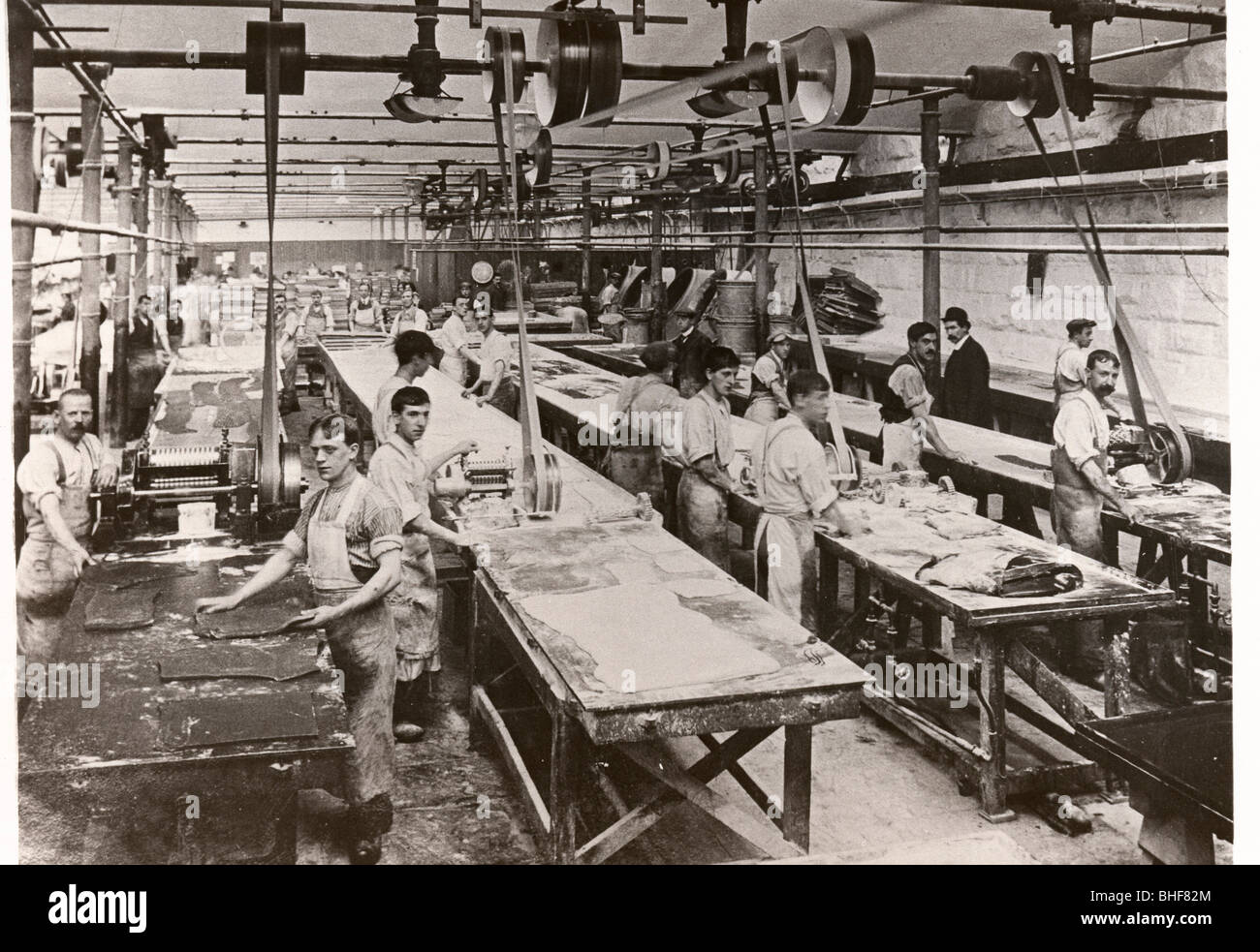 Men breaking toffee, Mackintosh Factory, Halifax, West Yorkshire Stock
