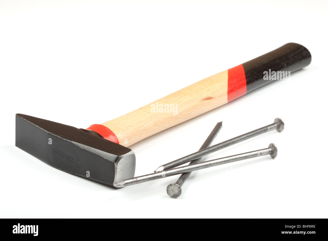 Hammer and nails on a white background Stock Photo