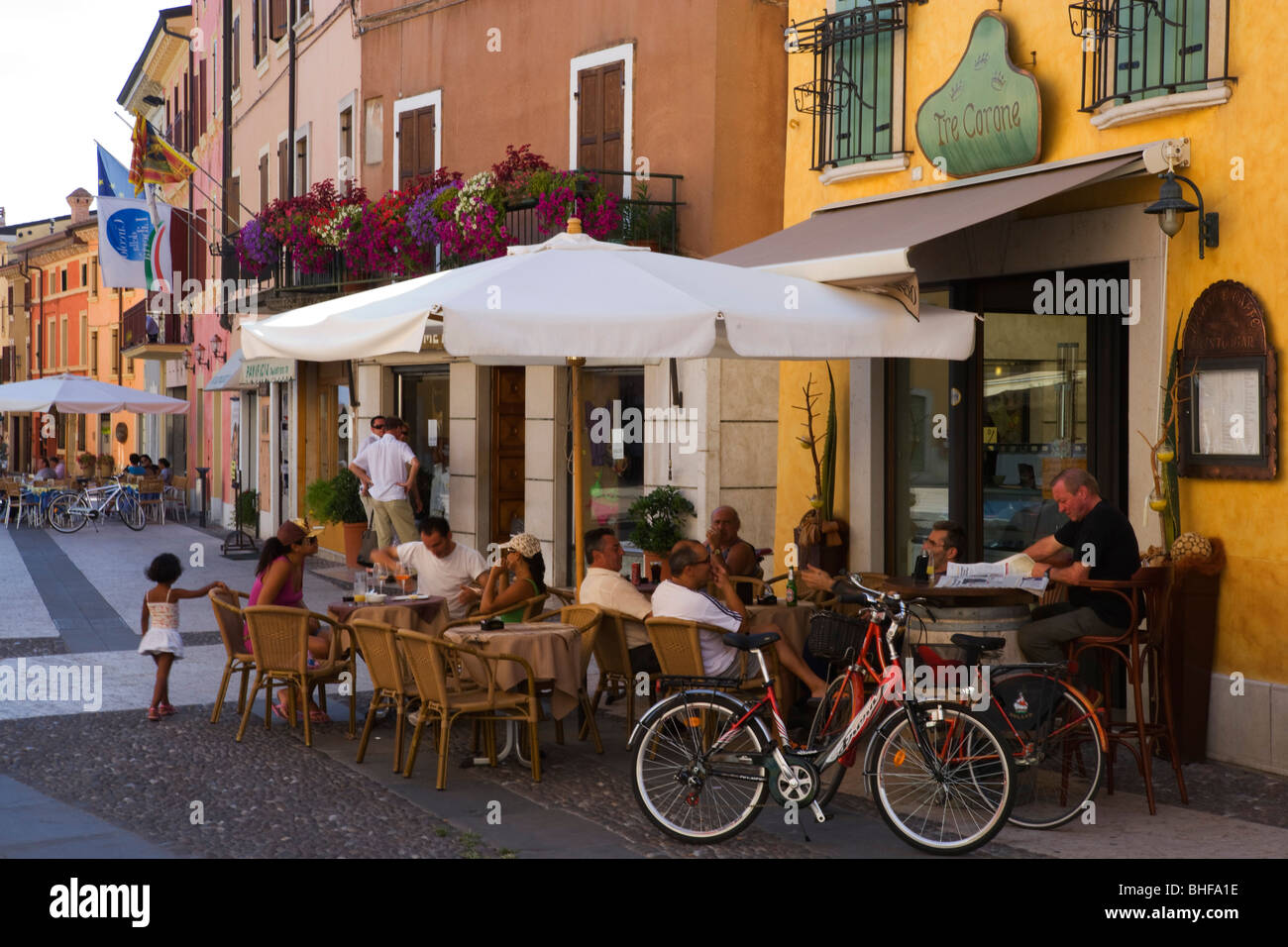 People in a cafe, Market square in Valeggio sul Mincio, Verona province, Veneto, Italy Stock Photo