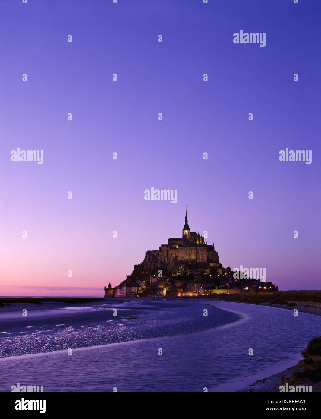 Le Mont St Michel at dusk, built on the island of Mont Tombe. Normandy