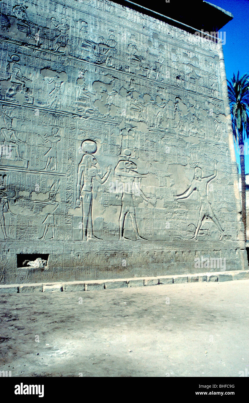 Reliefs of Pharaoh smiting enemies, The first Pylon, Temple of Khnum, Esna, Egypt. Artist: Unknown Stock Photo