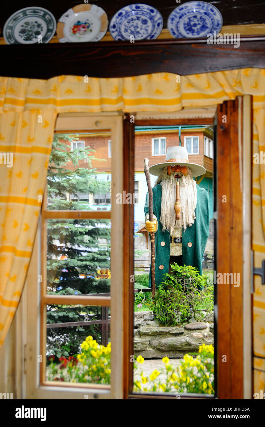 View through a window at a Ruebezahl statue at the village Pec, Bohemian mountains, east-bohemian, Czech Republic, Europe Stock Photo