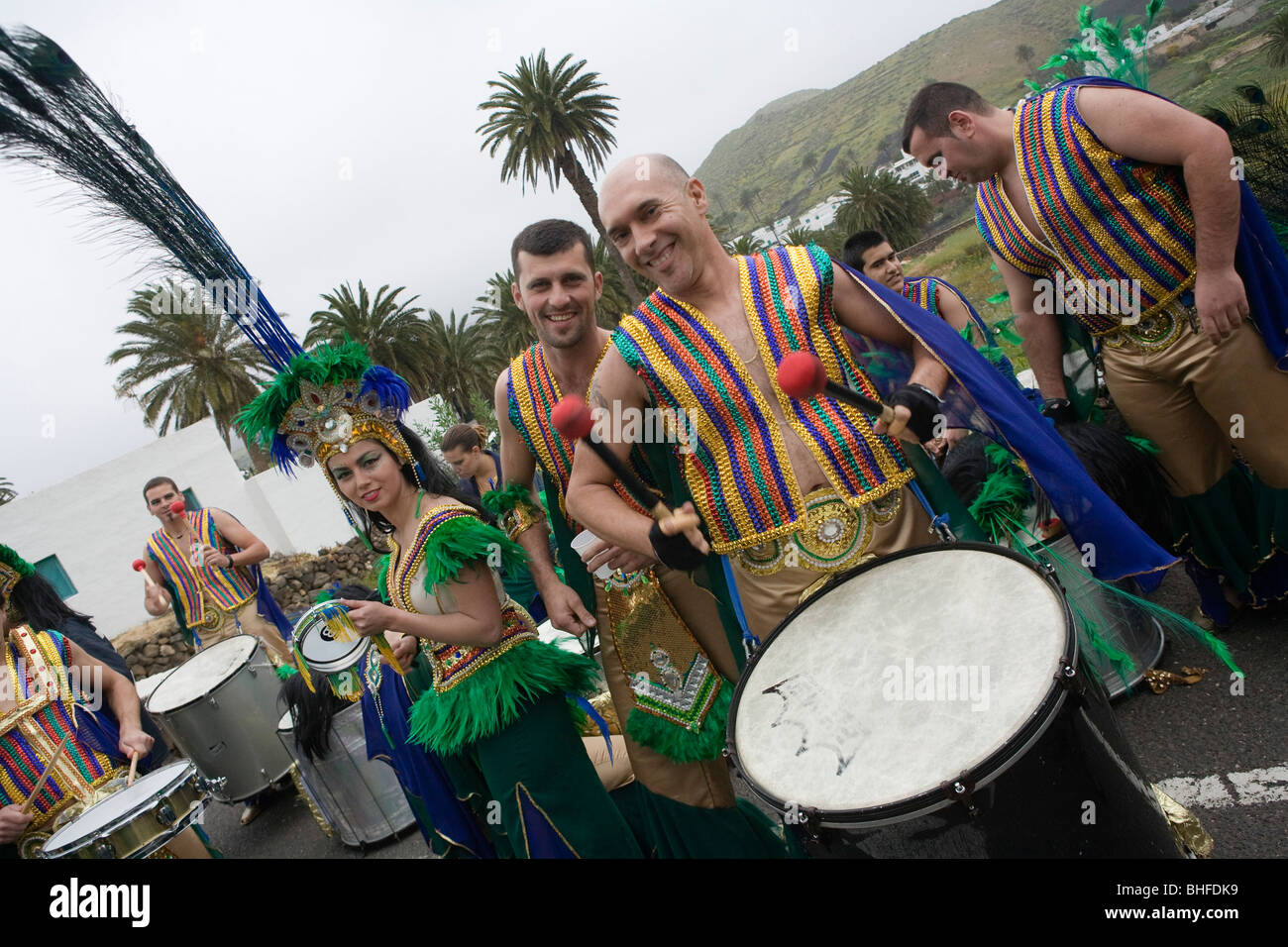 Men playing drums at carnival, dressed in costume, Haria, Lanzarote, Canary Islands, Spain, Europe Stock Photo