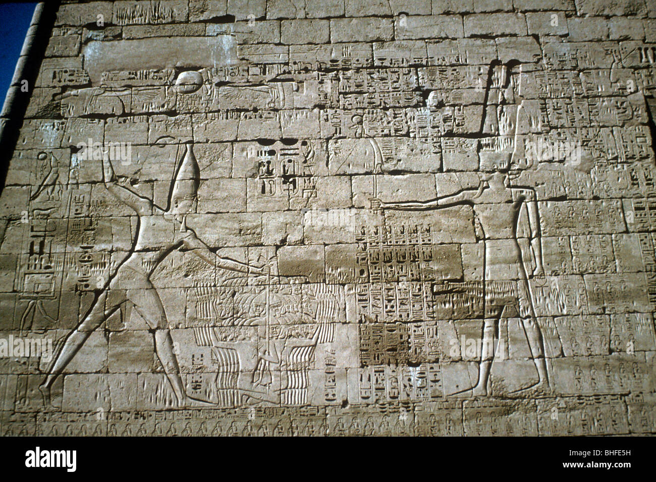 Relief of Rameses III smiting enemies, Mortuary Temple of Rameses III, Medinat Habu, c1200BC. Artist: Unknown Stock Photo