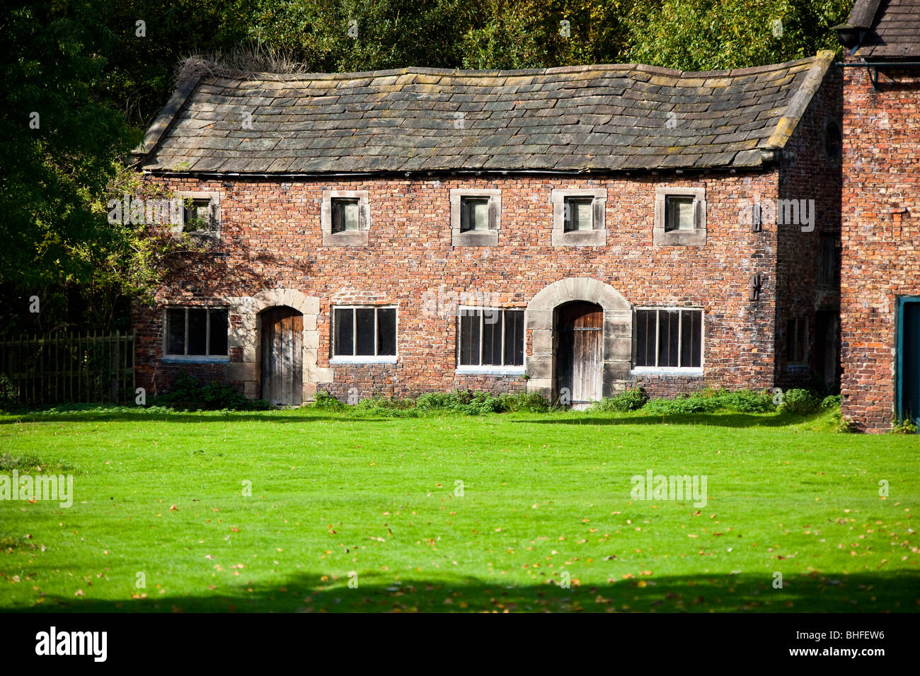 Barn cottages in the grounds of Dunham Massey Hall Stock Photo Alamy