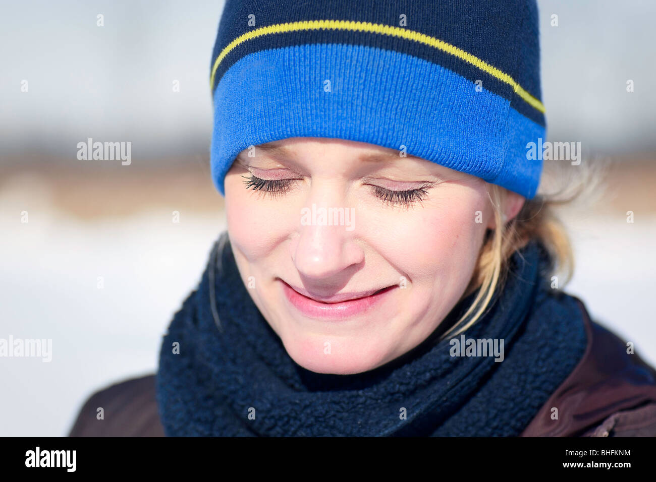 Portrait of a woman laughing outdoors in winter, Winnipeg, Manitoba, Canada. Stock Photo