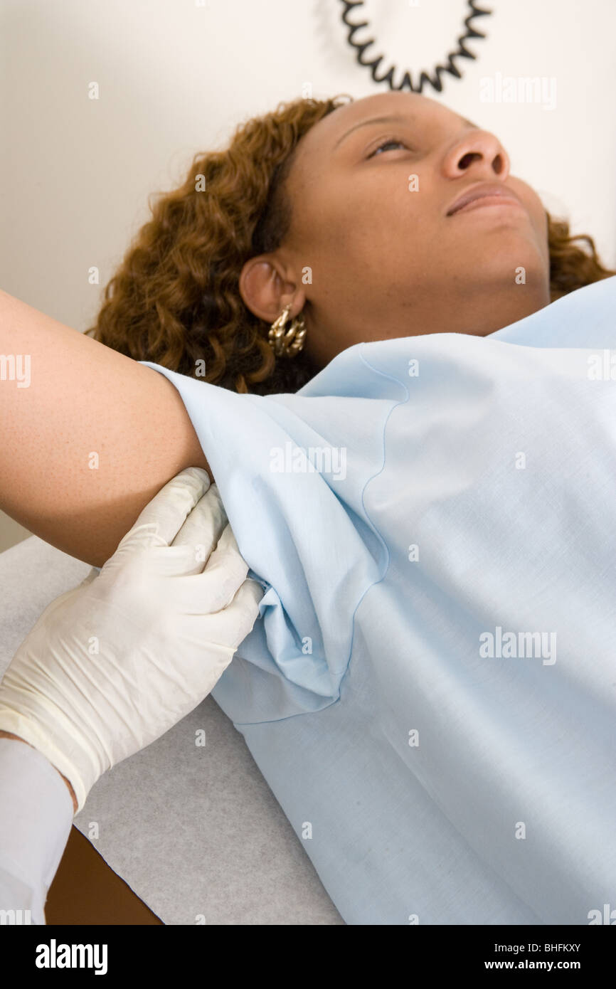 Female Patient Having Lymph Nodes Checked Stock Photo