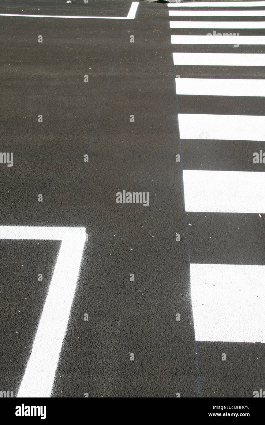 fresh paint on new zebra crossing Stock Photo Alamy