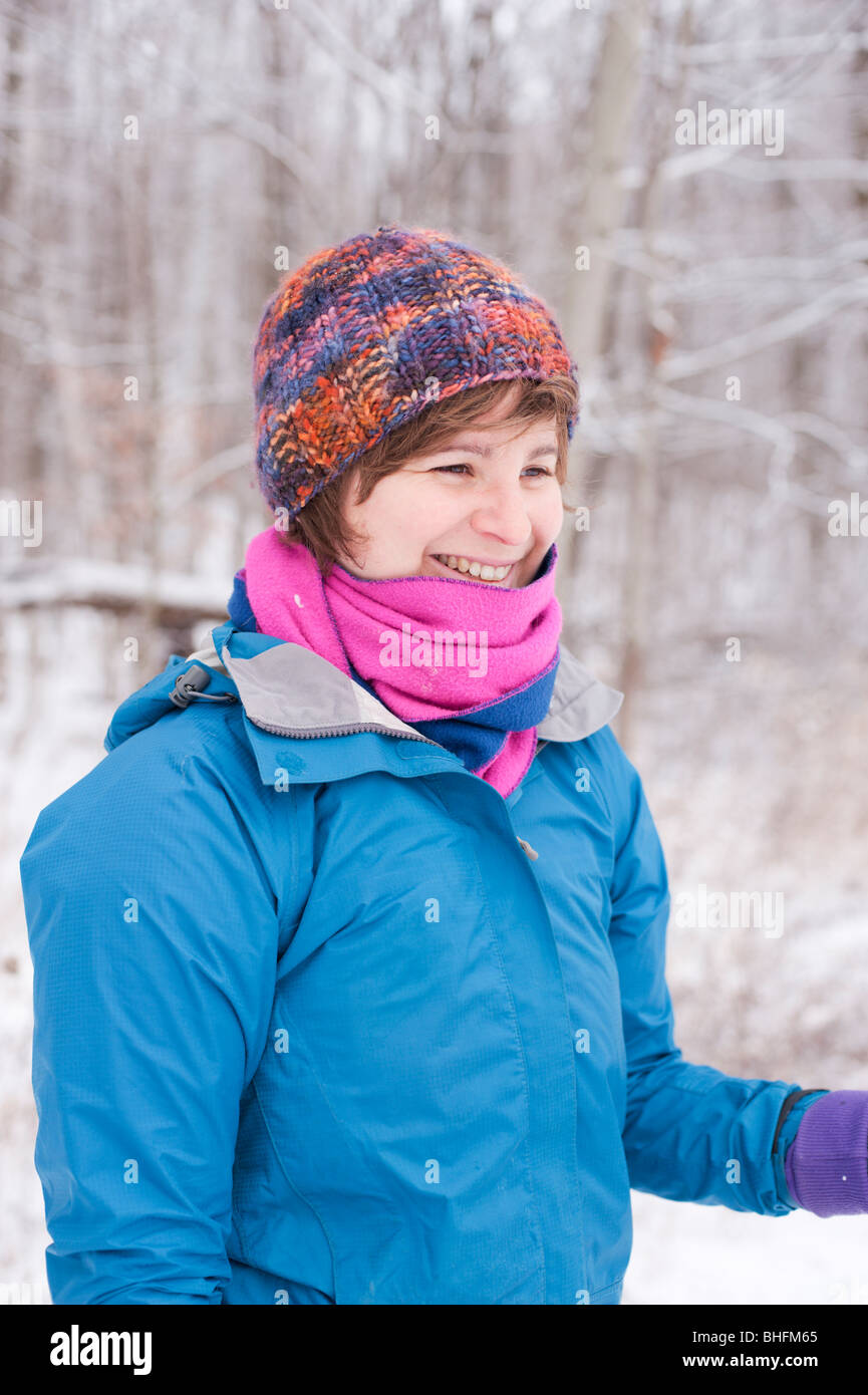 A portrait of a young Canadian woman enjoying the woods in winter, Kingston, Ontario Stock Photo