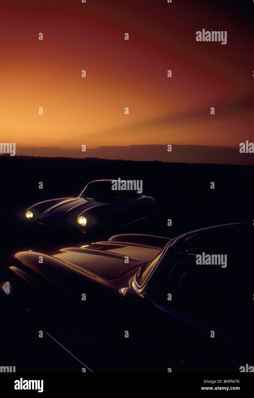 Two classic Mercedes 300SL cars parked at sunset. Location Monteray California. Stock Photo