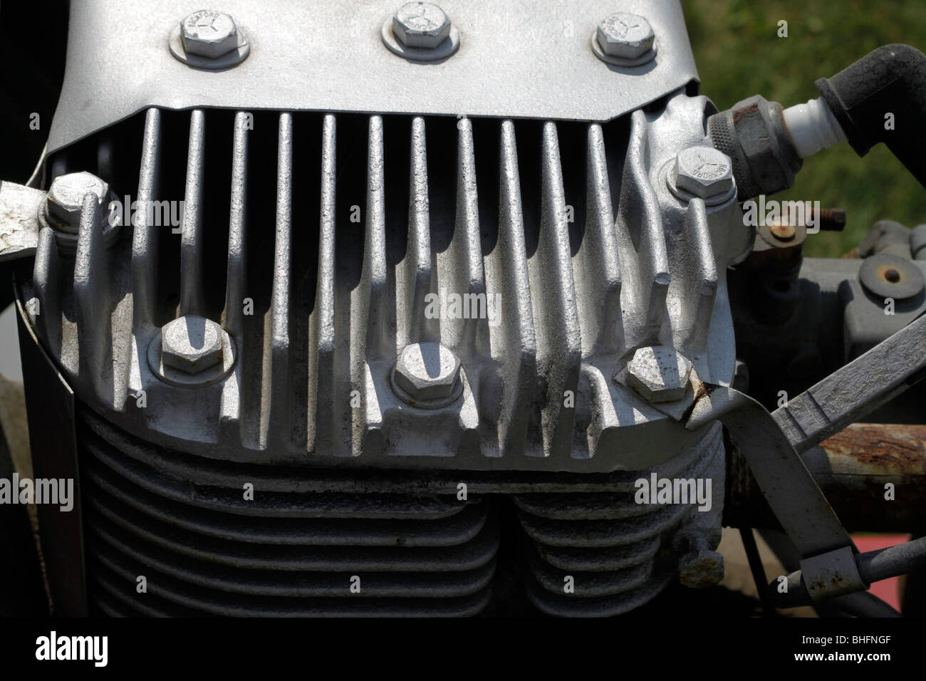 Air cooling fins on cylinder head of small side valve engine Stock Photo