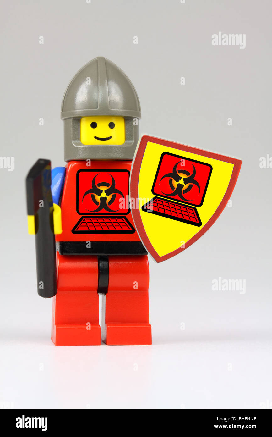Lego guard protecting against computer virus Stock Photo