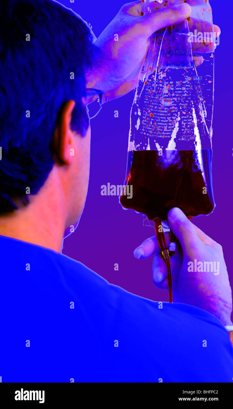Medical Professional Handles A Bag Of Fluids Stock Photo Alamy