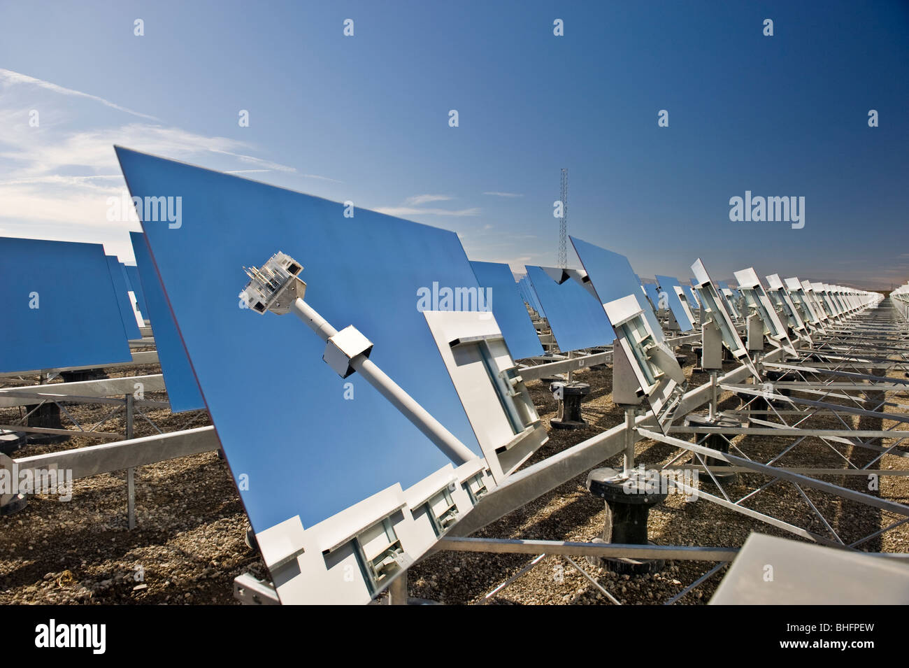 Heliostat mirrors with reflection of a towermounted receiver at a