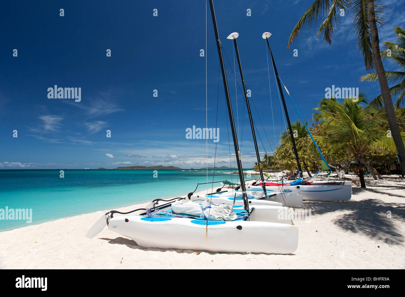 Hobie Cats wait to be used, Palm Island, St. Vincent and the Grenadines Stock Photo