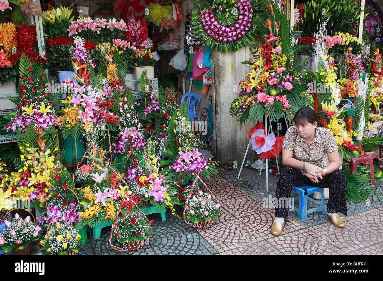 Vietnam, Ho Chi Minh City, Saigon, Ben Thanh Market flower vendor Stock