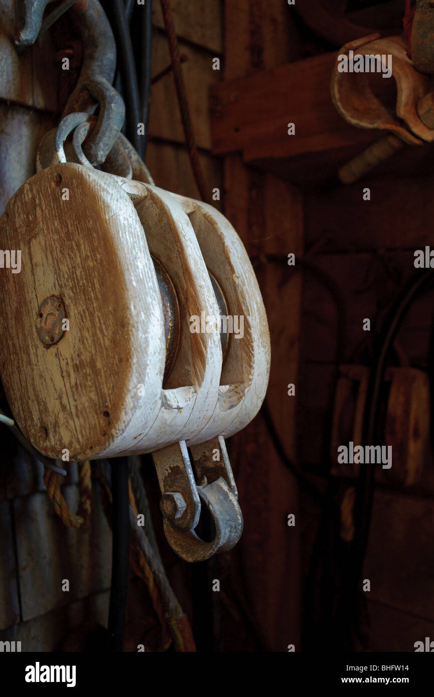 Block and tackle wooden pulley system Stock Photo