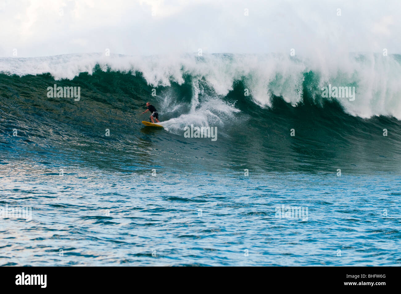 Towin surfer on big wave, Hawaii Stock Photo Alamy