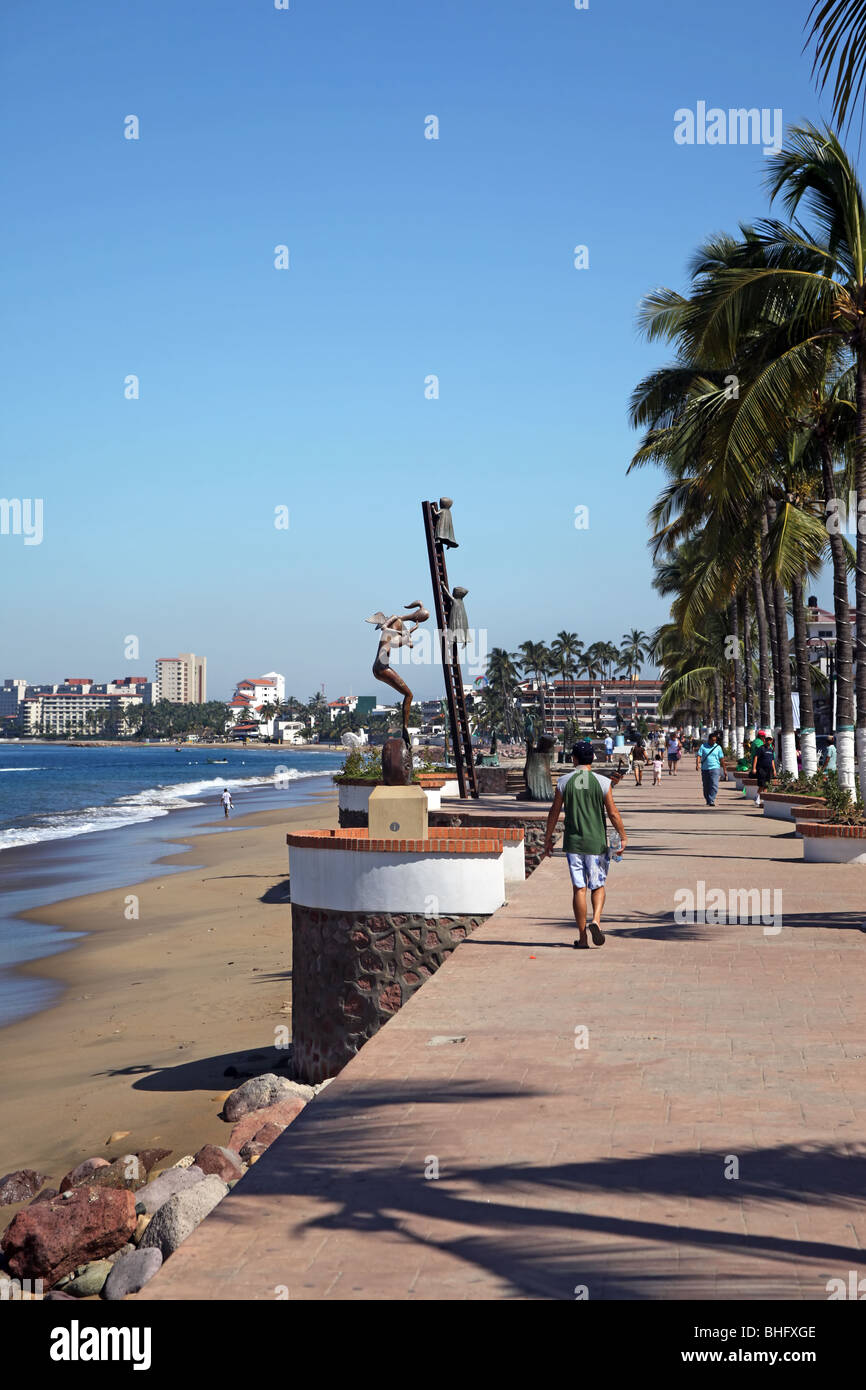 Downtown Puerto Vallarta, Mexico ocean walk.  Banderas Bay with palm trees. Mexican destination. Stock Photo