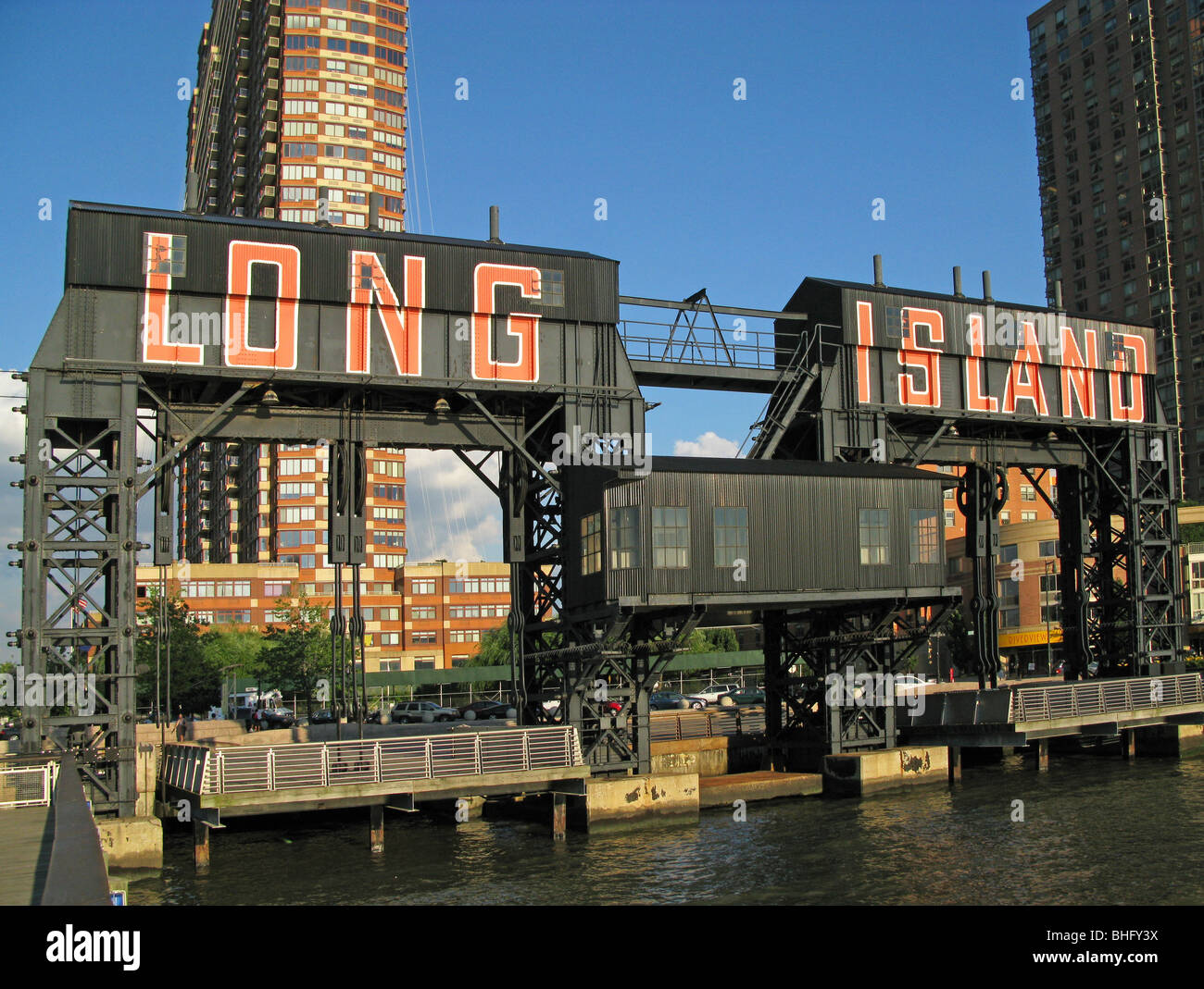 Long Island sign queens Queens New York Long Island City waterfront old rail car landing  new buildings Stock Photo