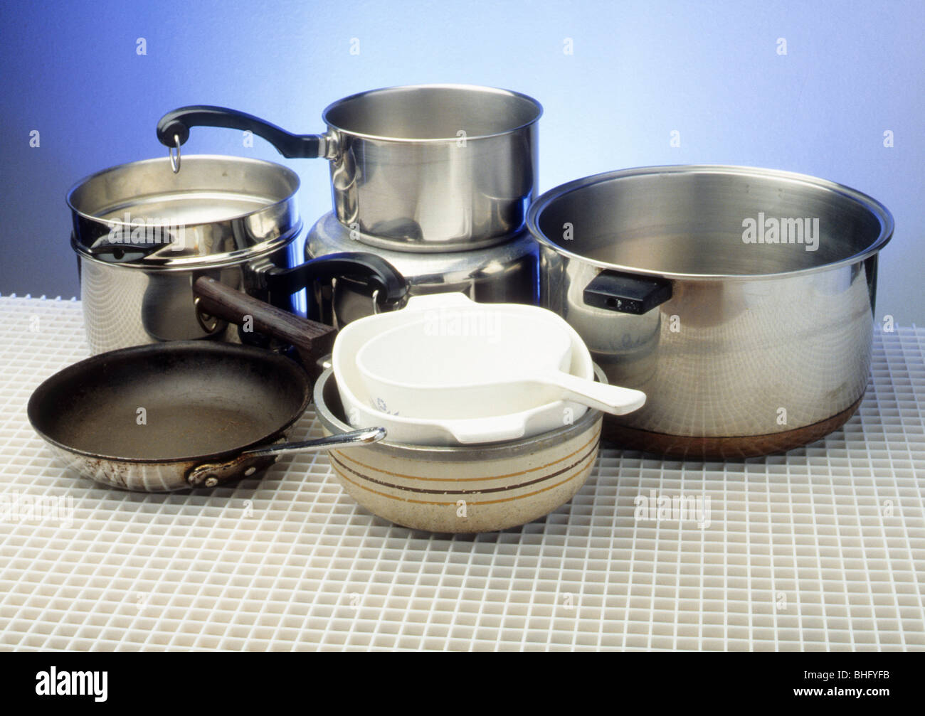 pot pan fry skillet double boiler non-stick teflon ceramic Corning ware Stock Photo