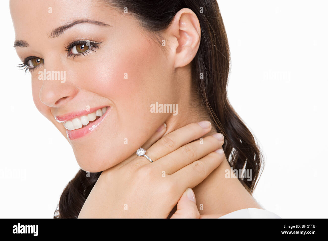 Smiling woman wearing an engagement ring Stock Photo