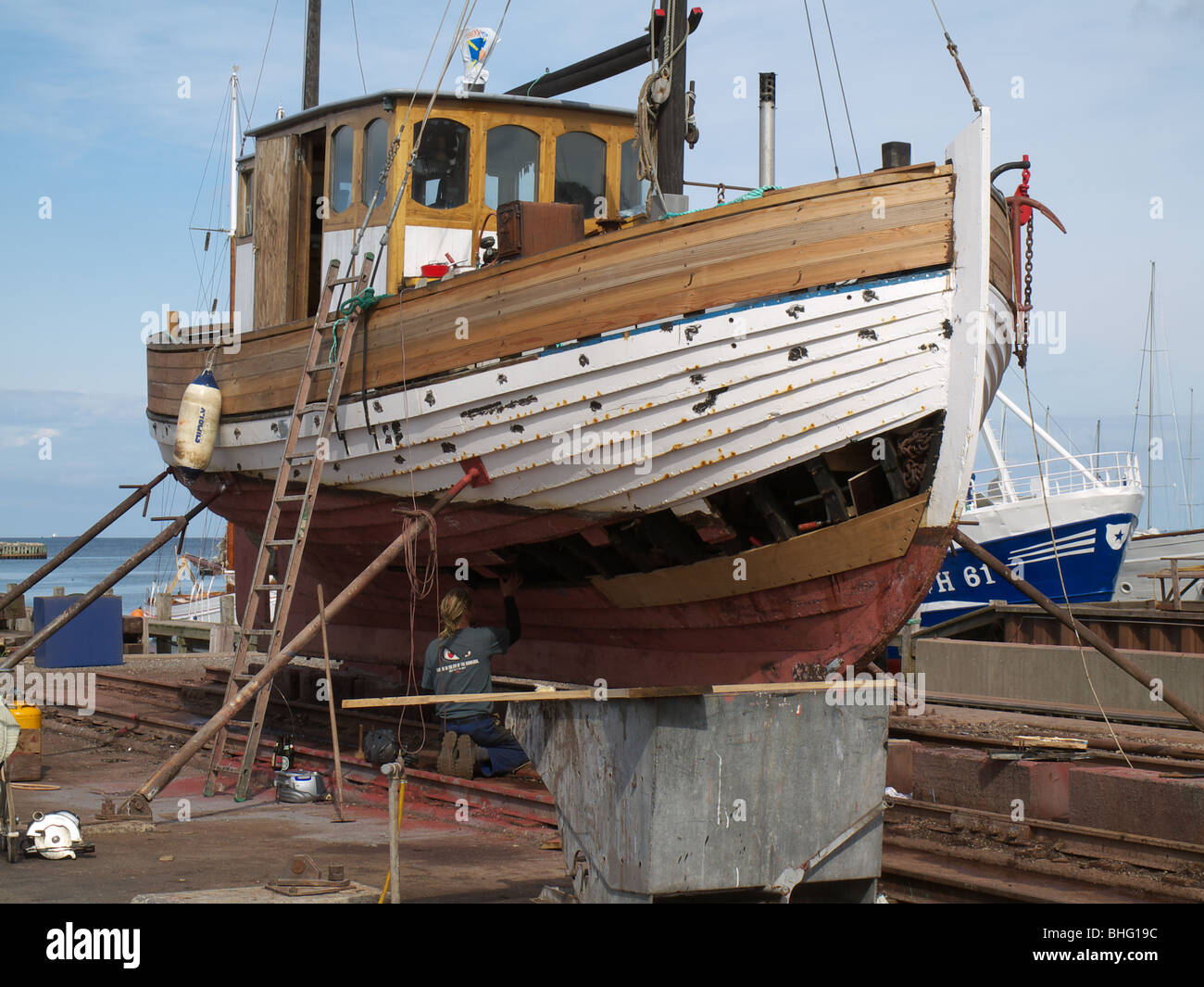 Vintage cutter under repair on a shipyard in Gilleleje. Stock Photo