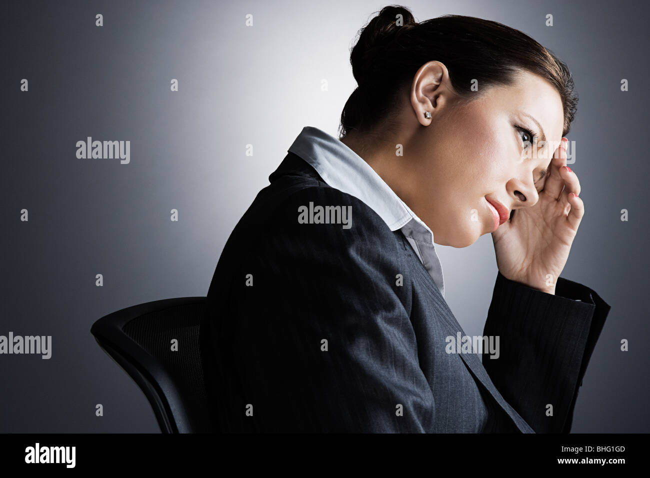 Stressed businesswoman sitting office hi-res stock photography and ...