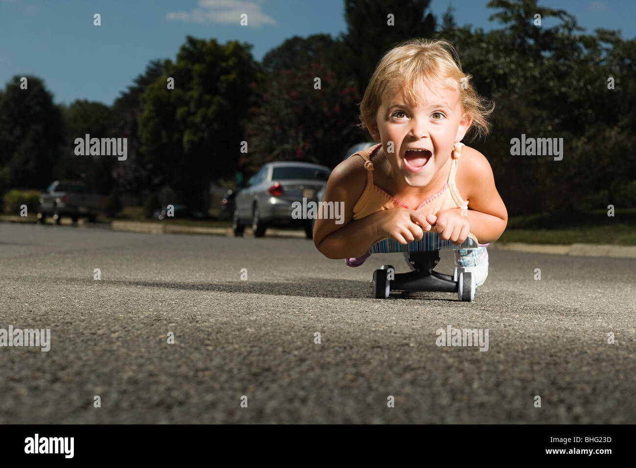 Little girl on a skateboard Stock Photo Alamy