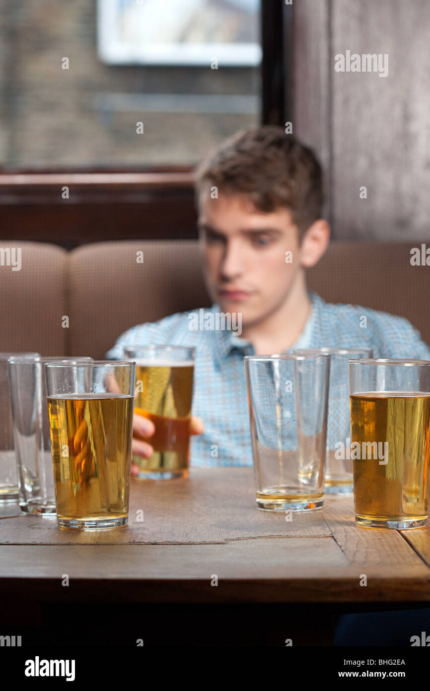 Young man in bar Stock Photo