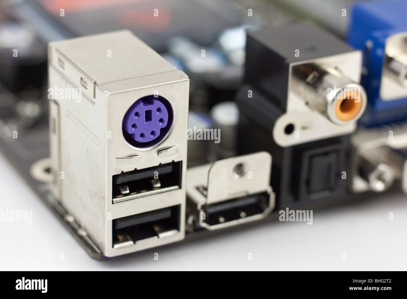 Keyword, mouse, PS/2, USB, HDMI, SPDIF, coaxial, optical, ports on the computer mainboard Stock Photo