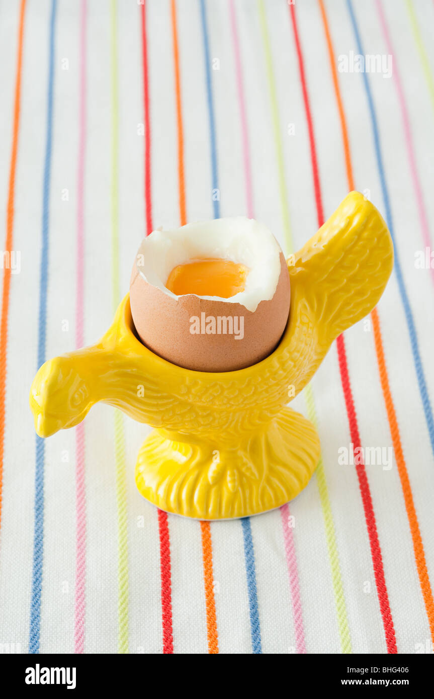 Boiled egg in eggcup Stock Photo