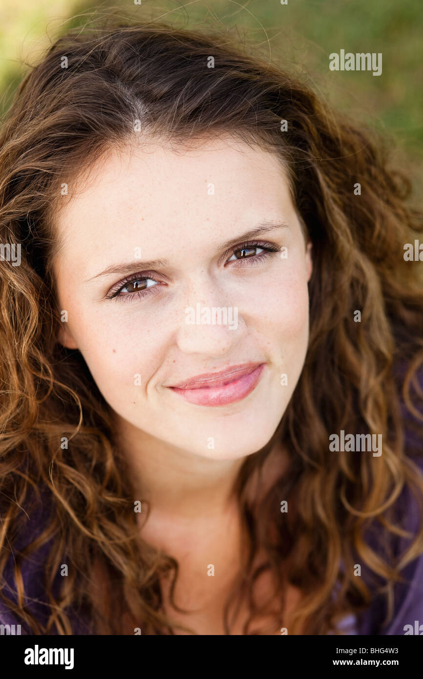 young woman looking at camera Stock Photo