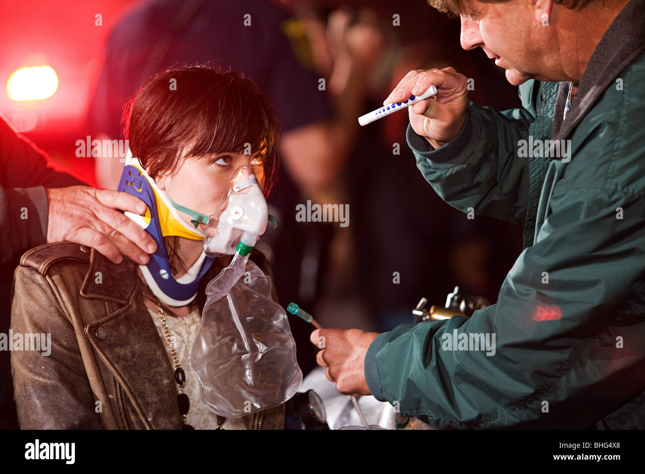 Young woman receiving medical attention Stock Photo