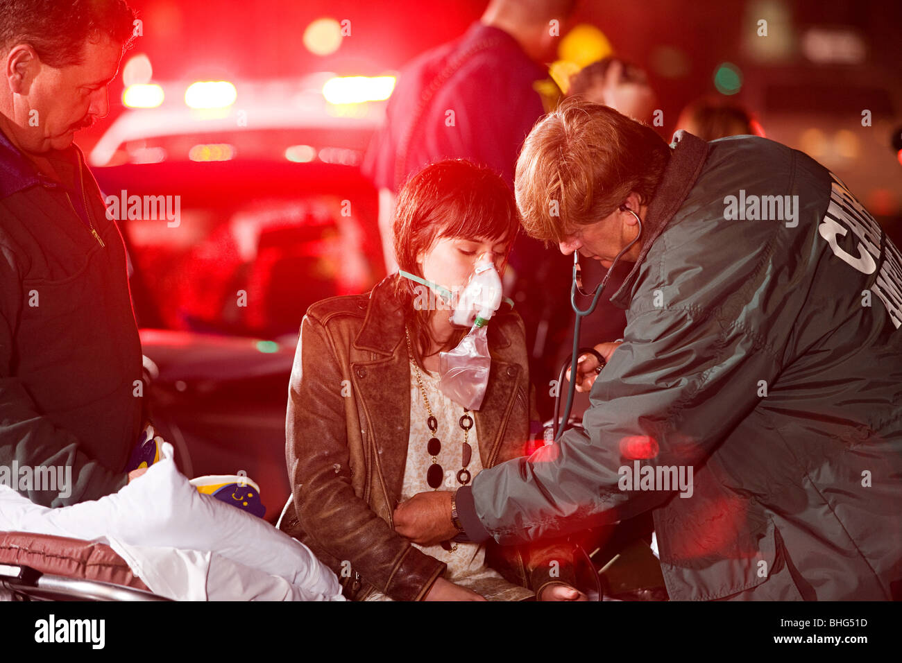 Young woman receiving medical attention Stock Photo