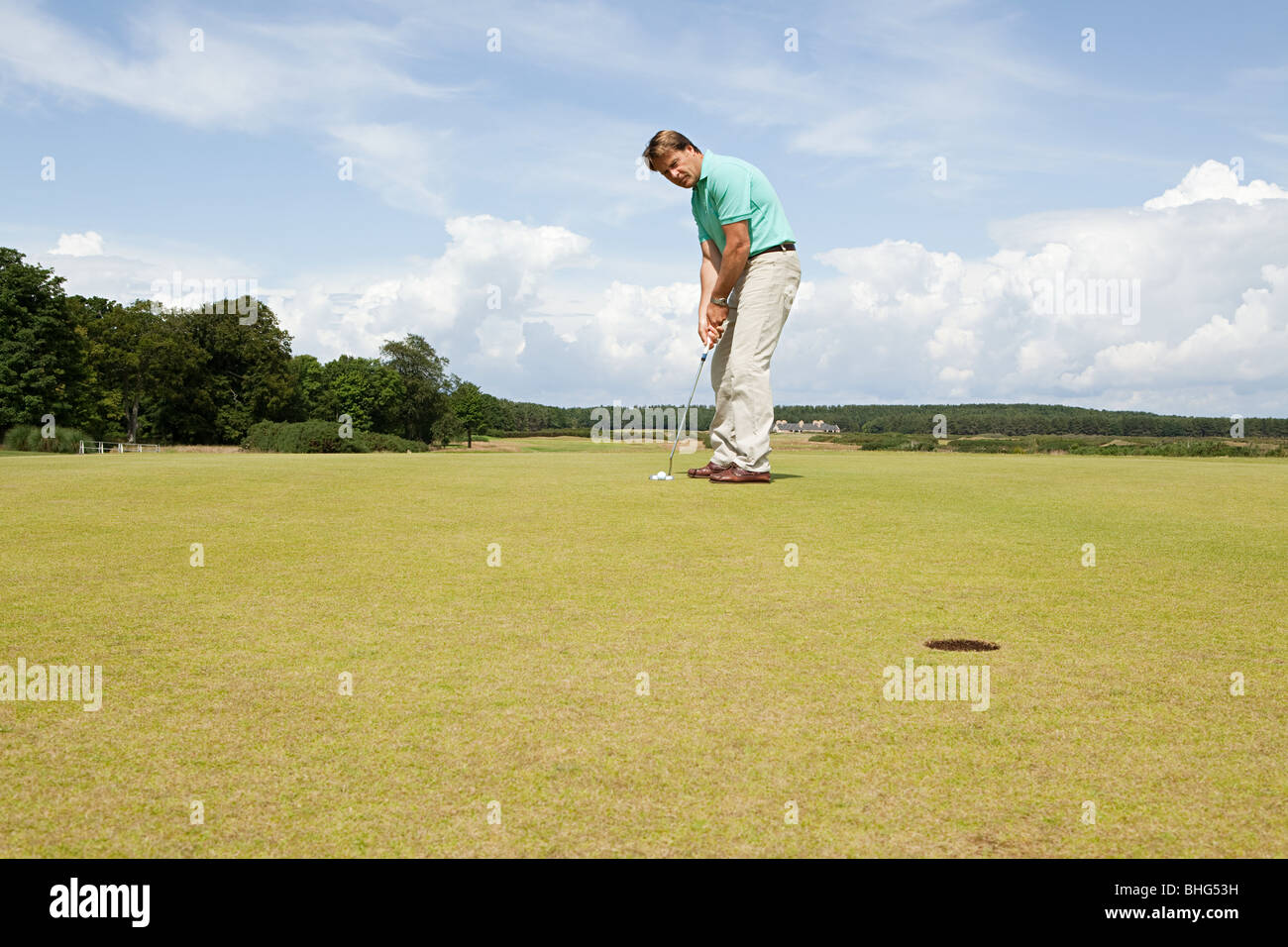 Man playing golf Stock Photo Alamy
