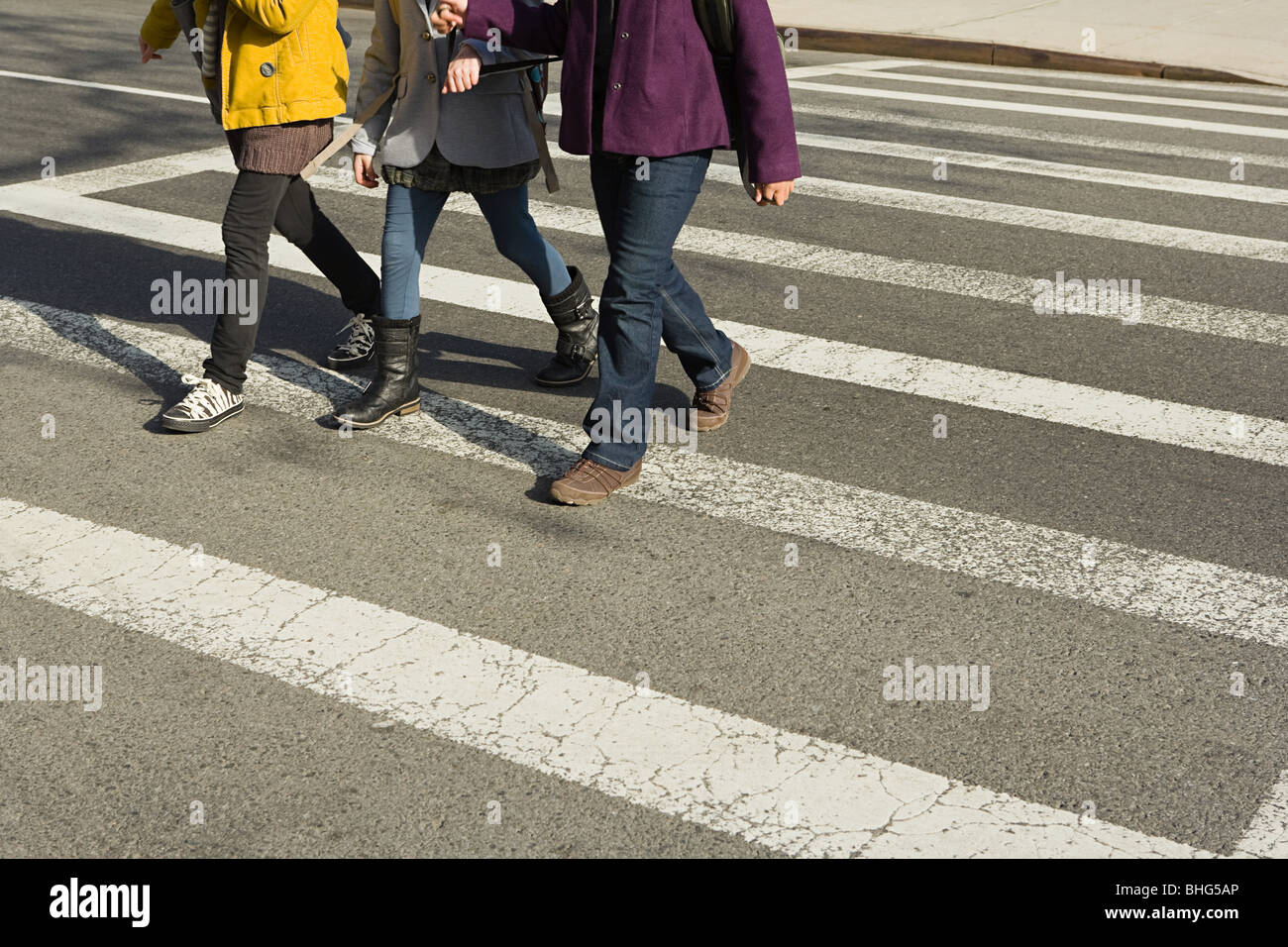 Children walking across road Stock Photo - Alamy