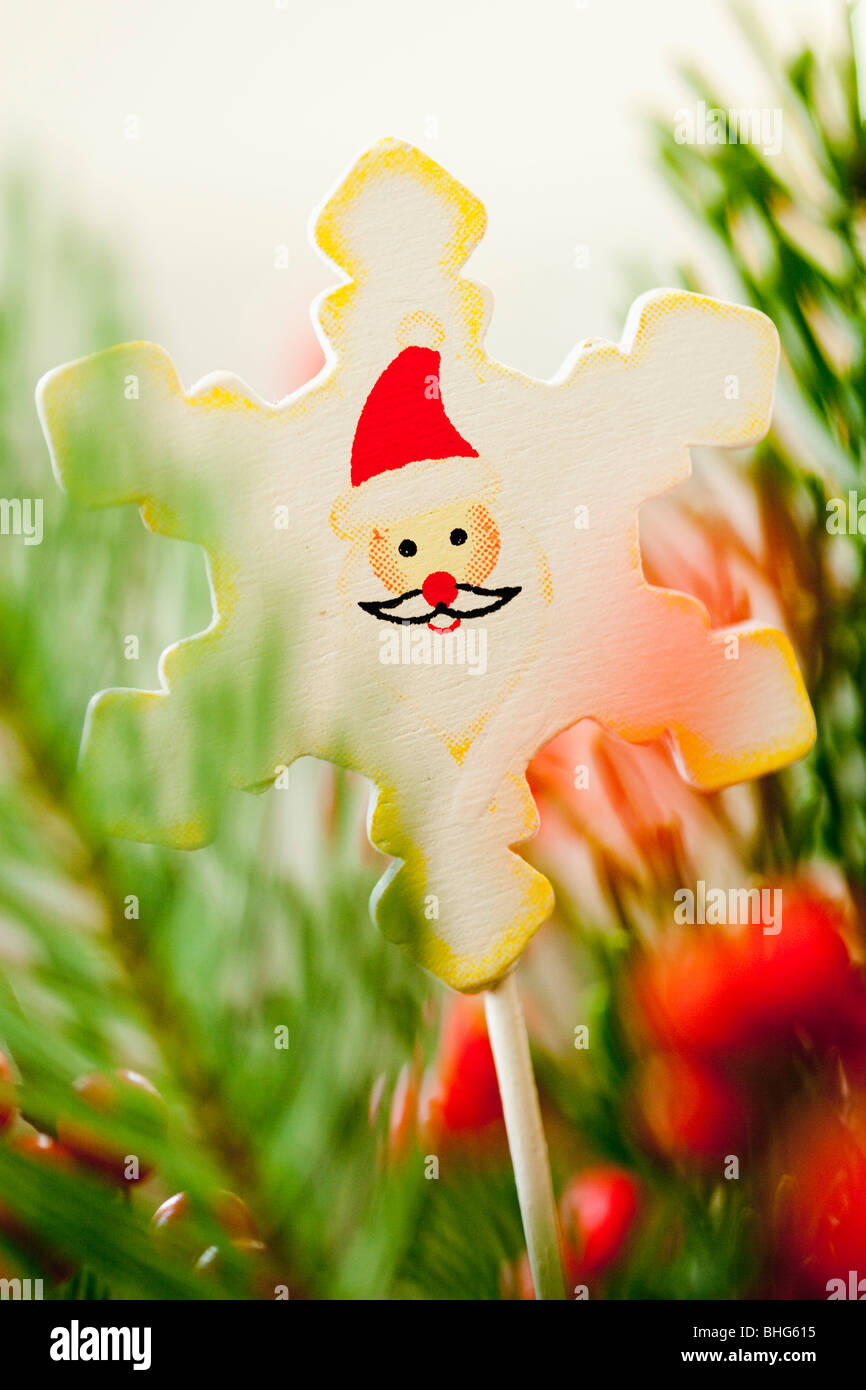 christmas decoration amongst branches Stock Photo