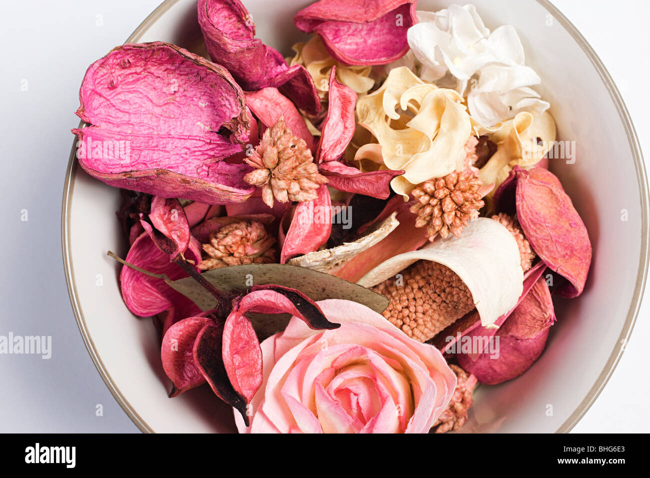 Using dry rose petals to make rose potpourri which is great for