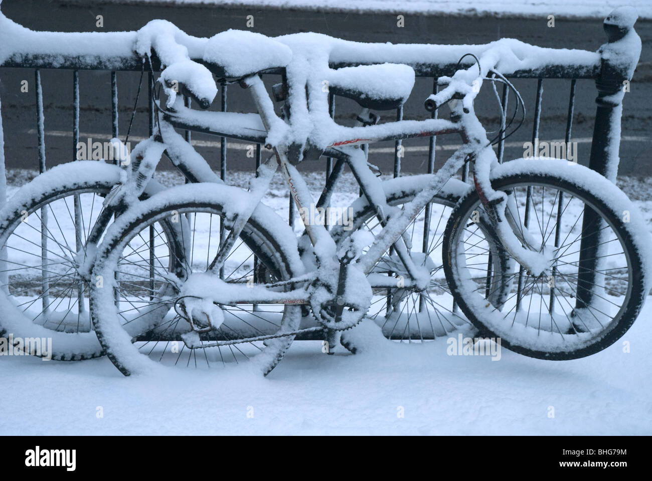Snow covered bicycles, London, UK Stock Photo Alamy