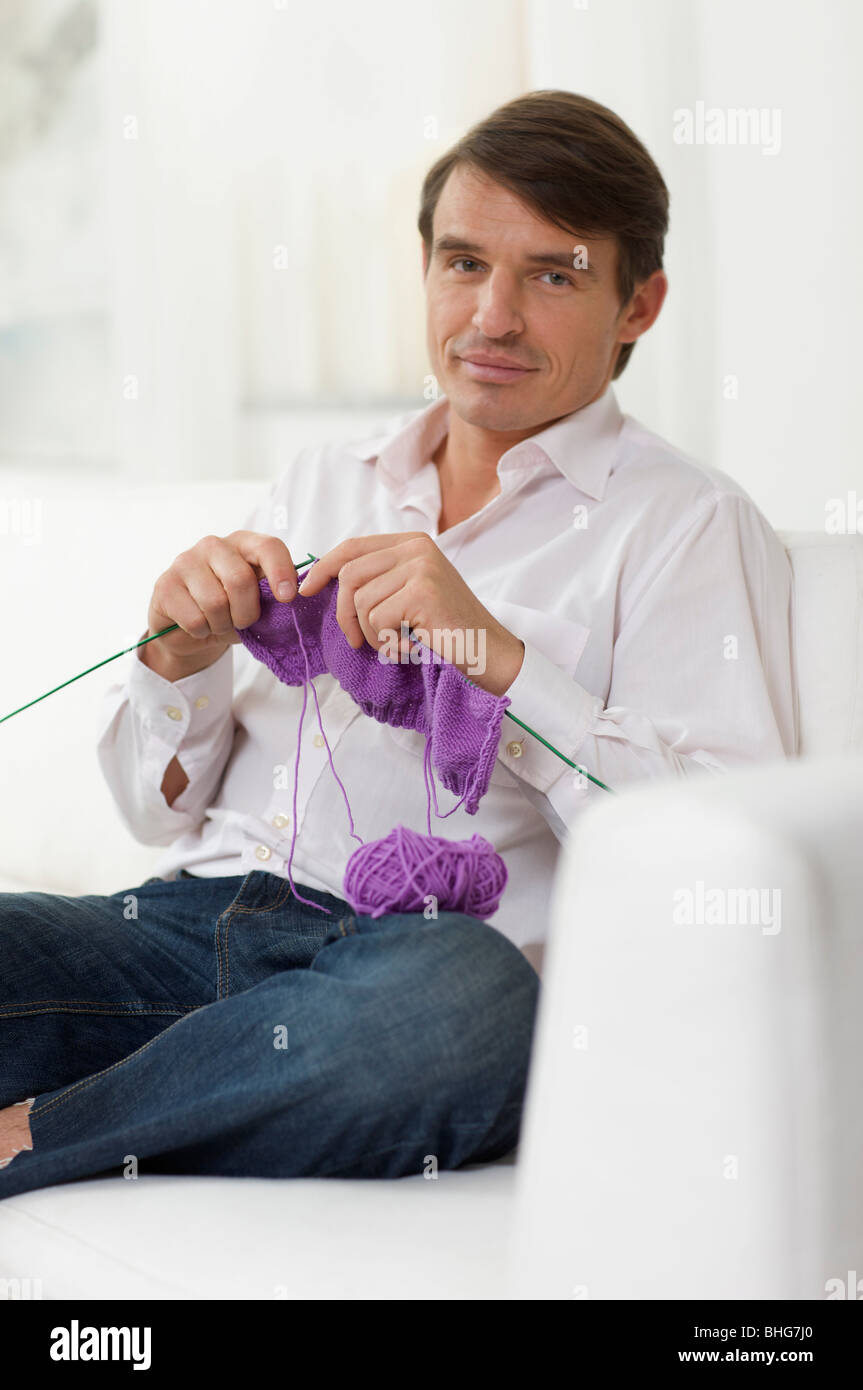 knitting man and his favorite color Stock Photo Alamy