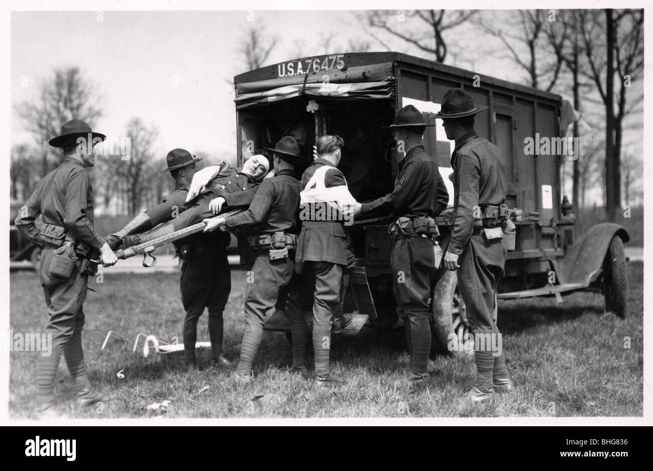 Two wounded soldiers being helped into an ambulance, Fort Sheridan