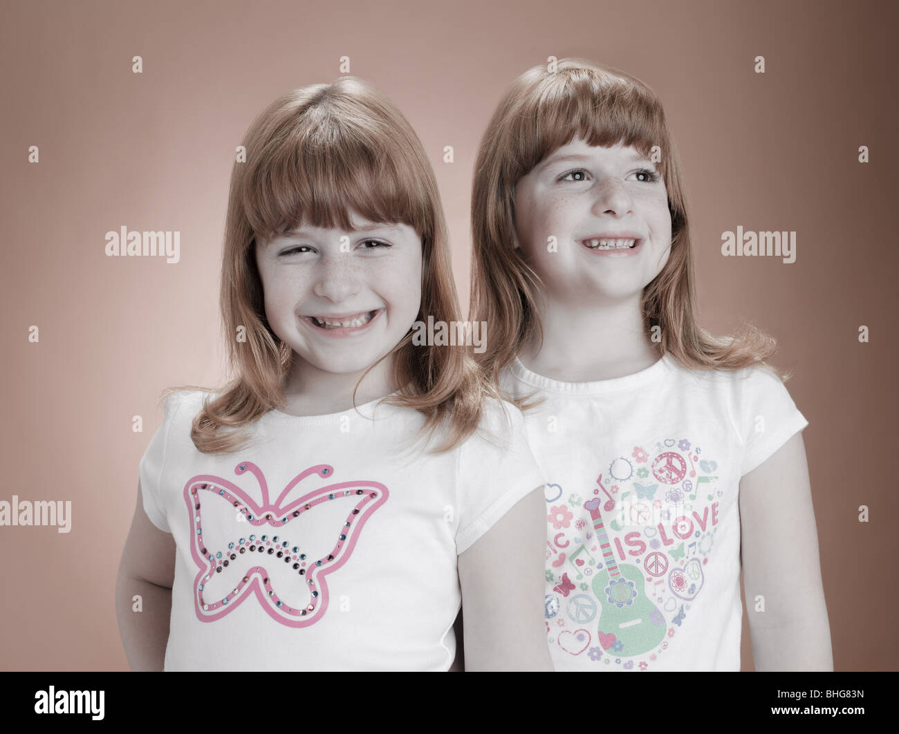 Identical twin girls Stock Photo
